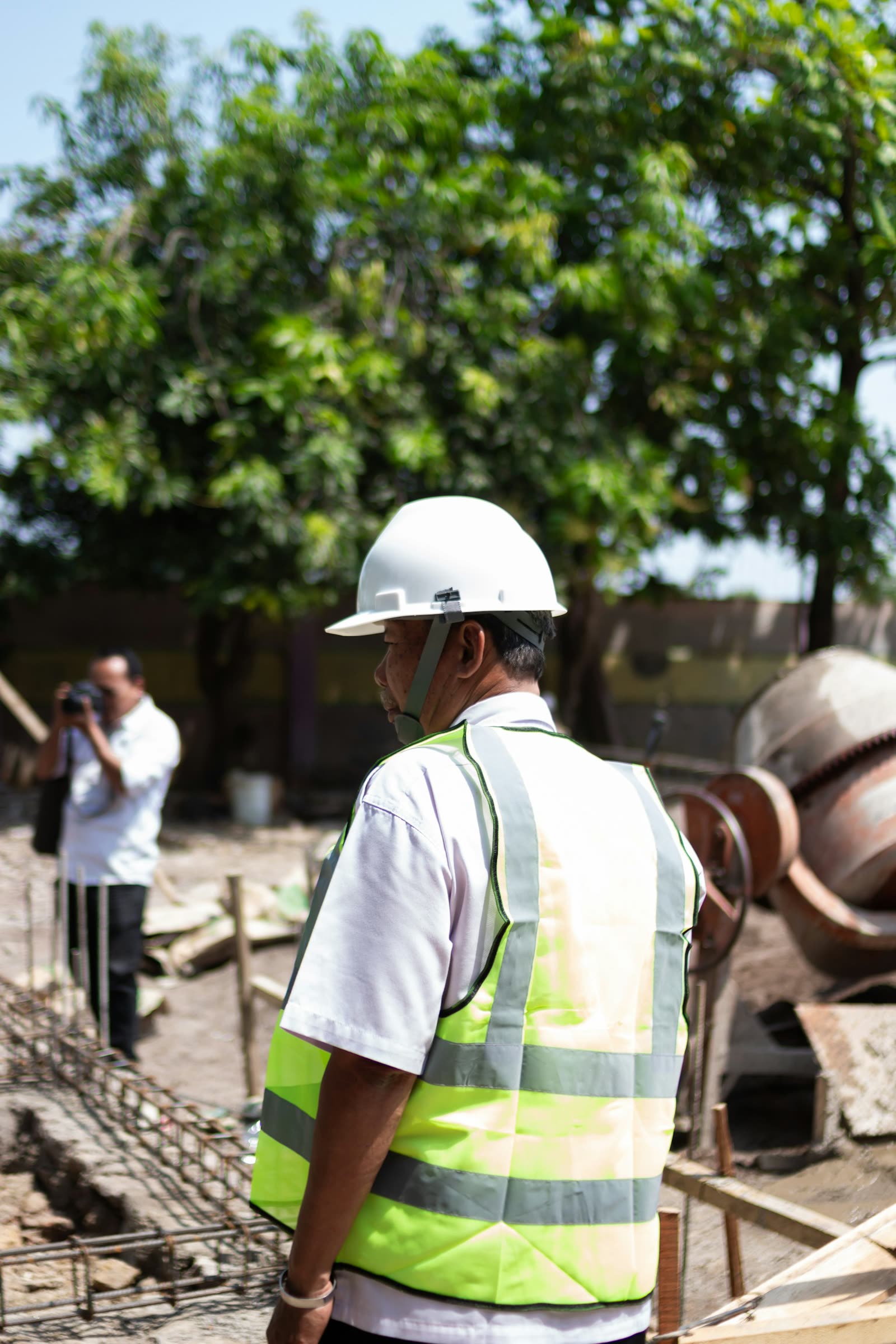 Technician in protective equipment on site