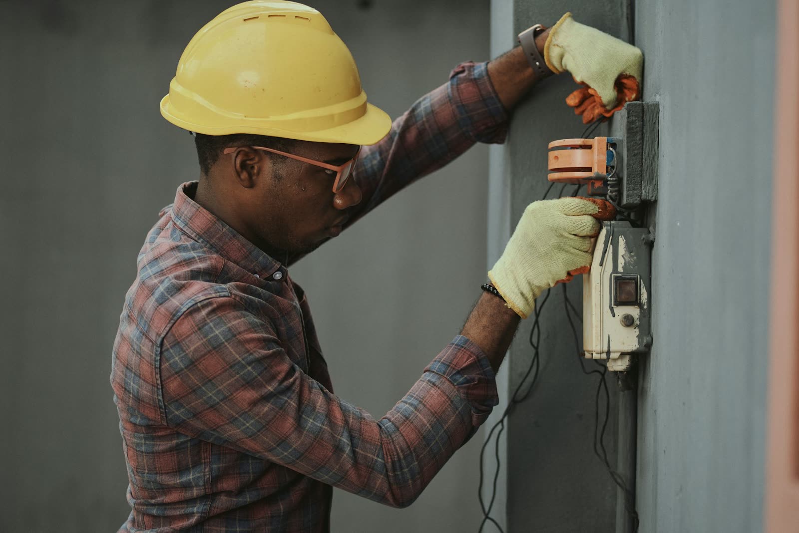 Technician servicing lift machinery